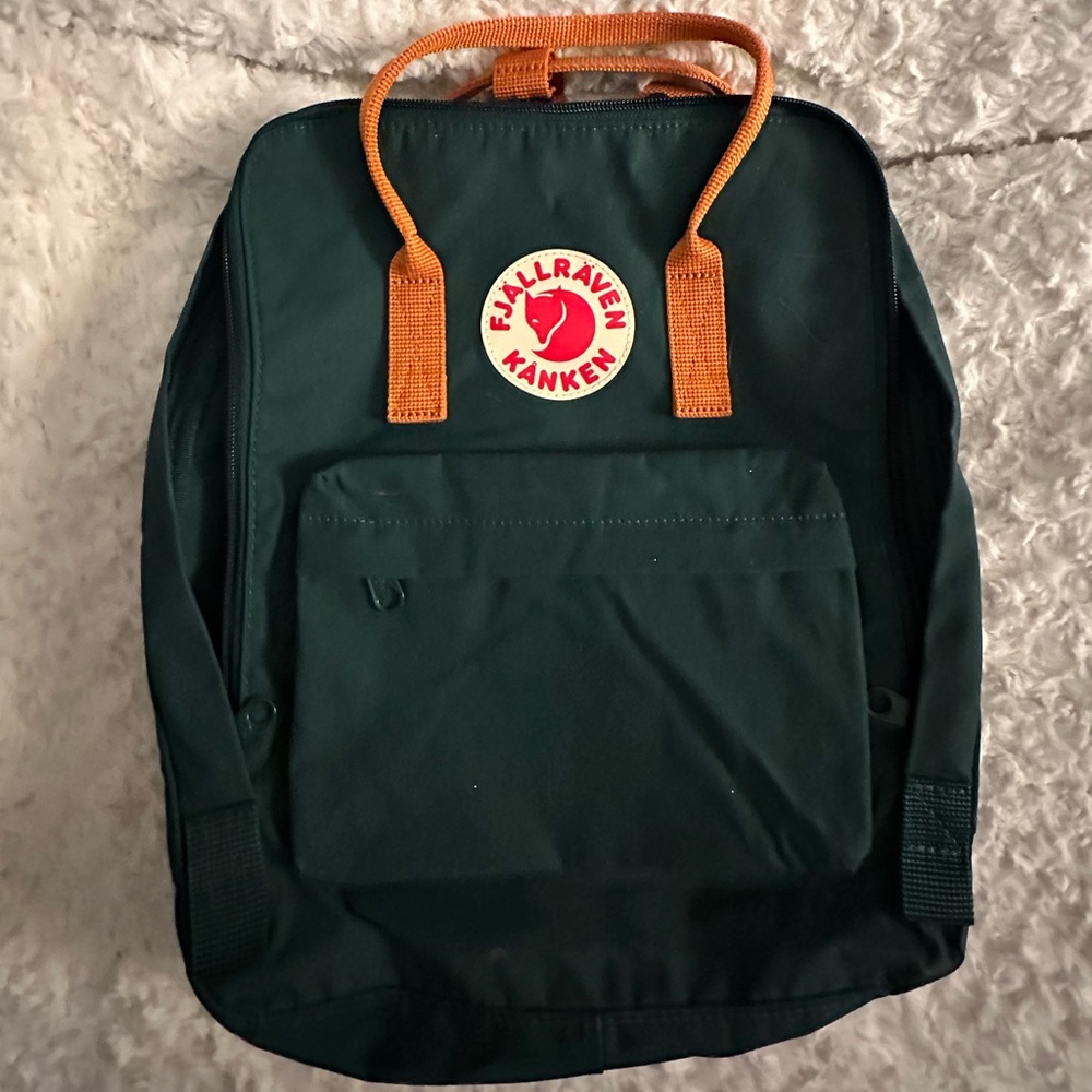 Fjallraven Kanken Backpack in Dark Green with Orange Handles